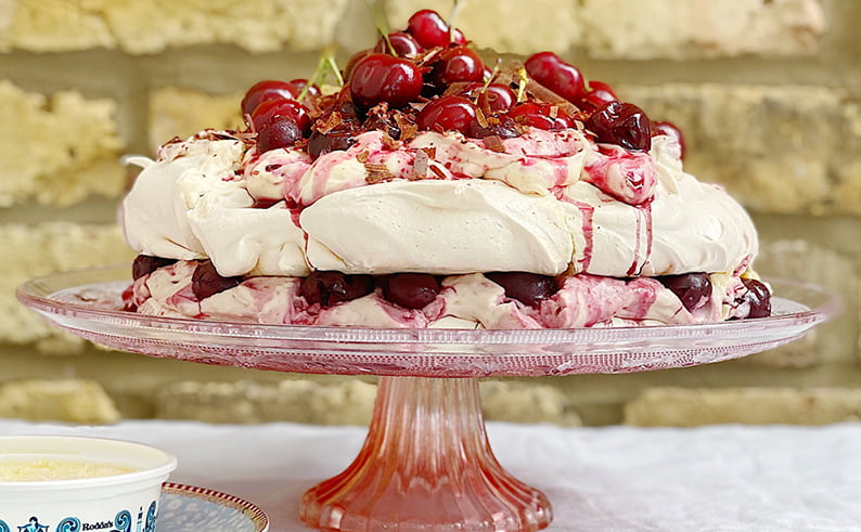 meringue masterpiece with cherries and cream